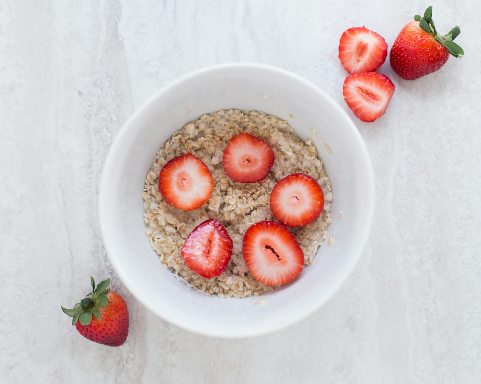 high protein breakfast oats in a white ceramic bowl